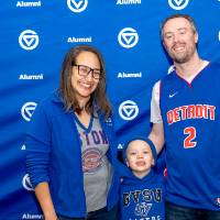 Group of three posing for photo